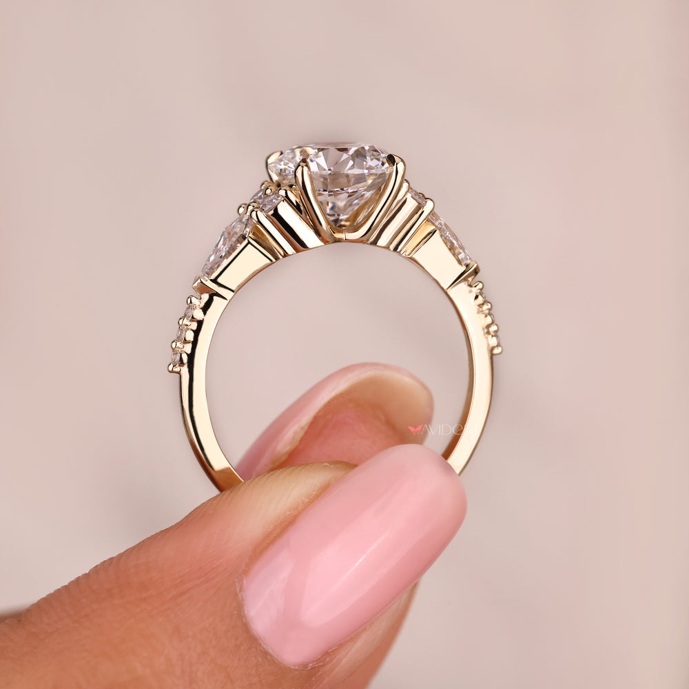 Round cut lab diamond ring with side stone details
