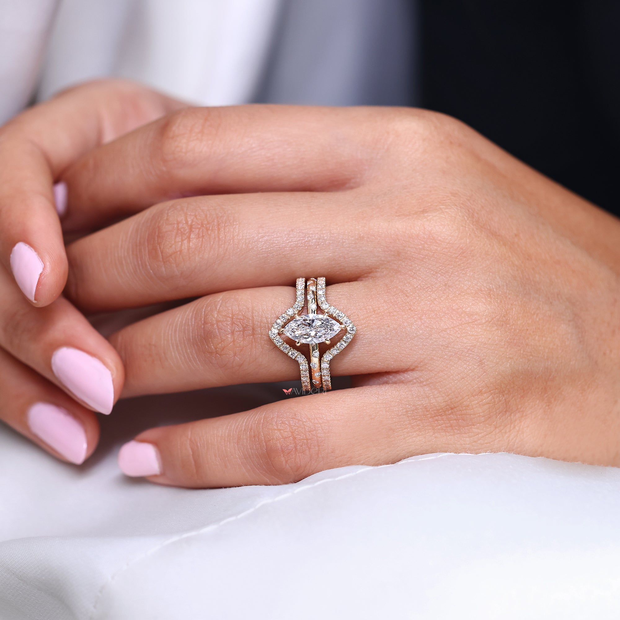 Marquise diamond ring in flush pave setting.