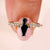 Coffin cut engagement ring with black coffin ring.