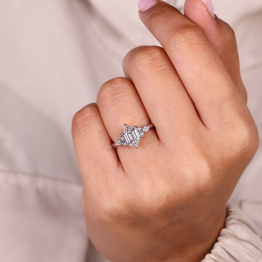 Seven stone diamond ring with marquise side stone details.