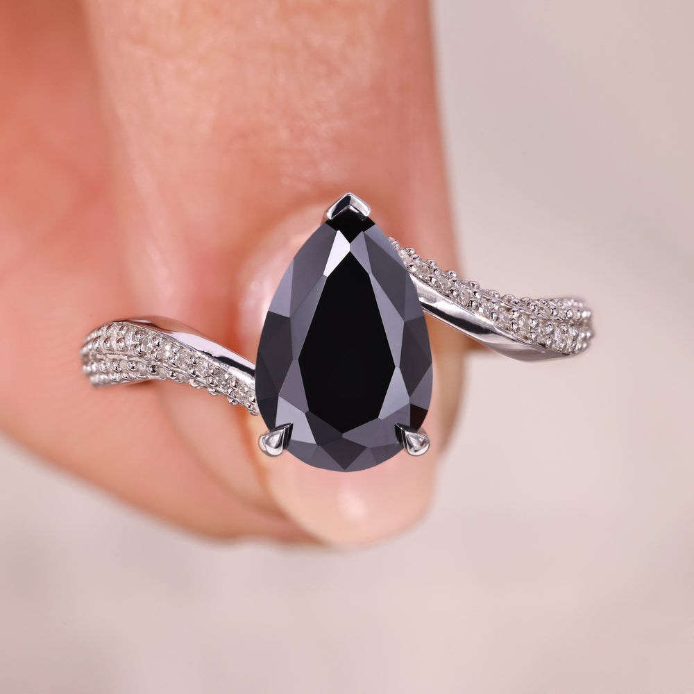 Engagement ring bypass setting with a unique, elegant design.