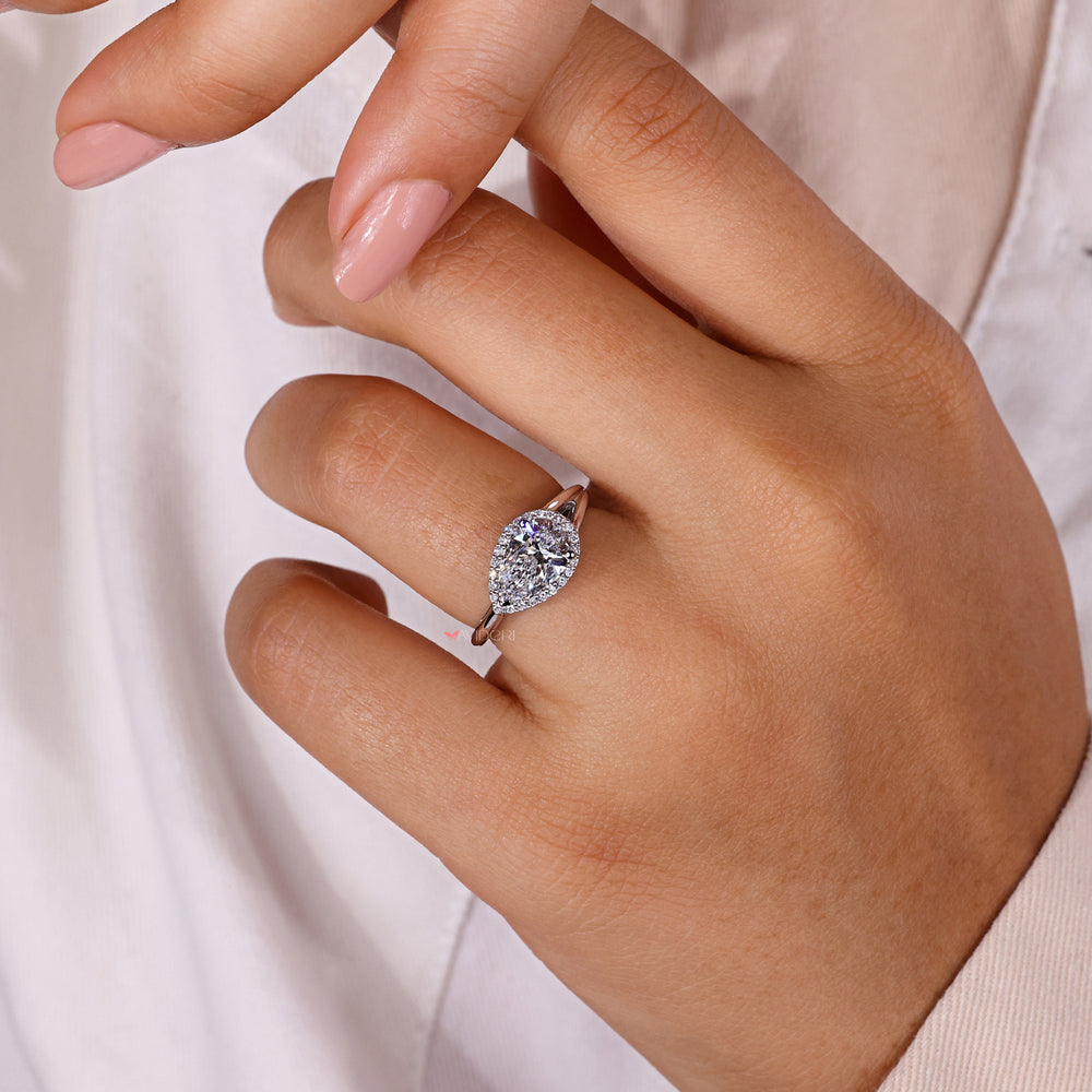 Halo diamond ring with a ring split shank.
