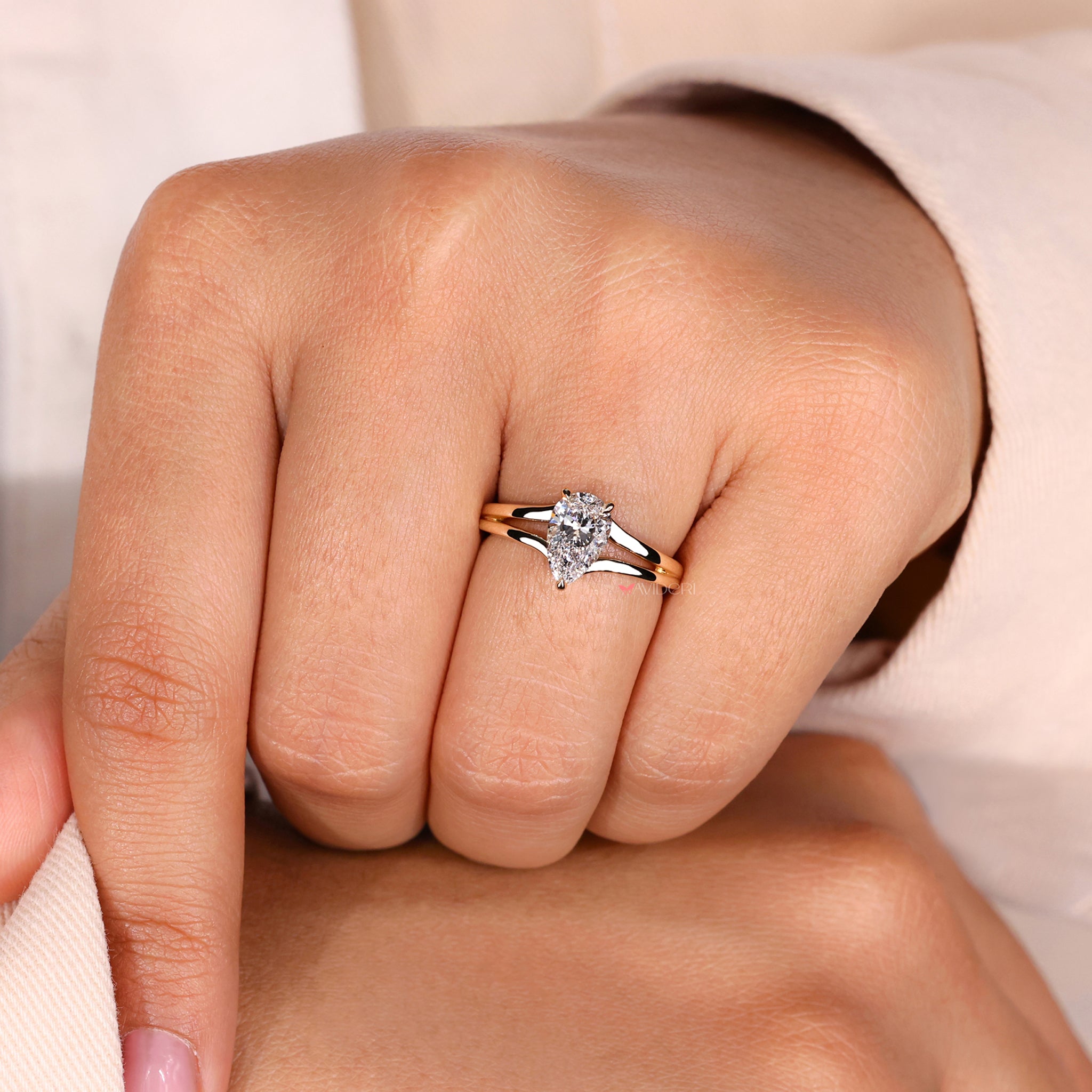 Split shank ring with a hidden halo engagement ring design, crafted from lab grown diamonds for sustainable elegance.
