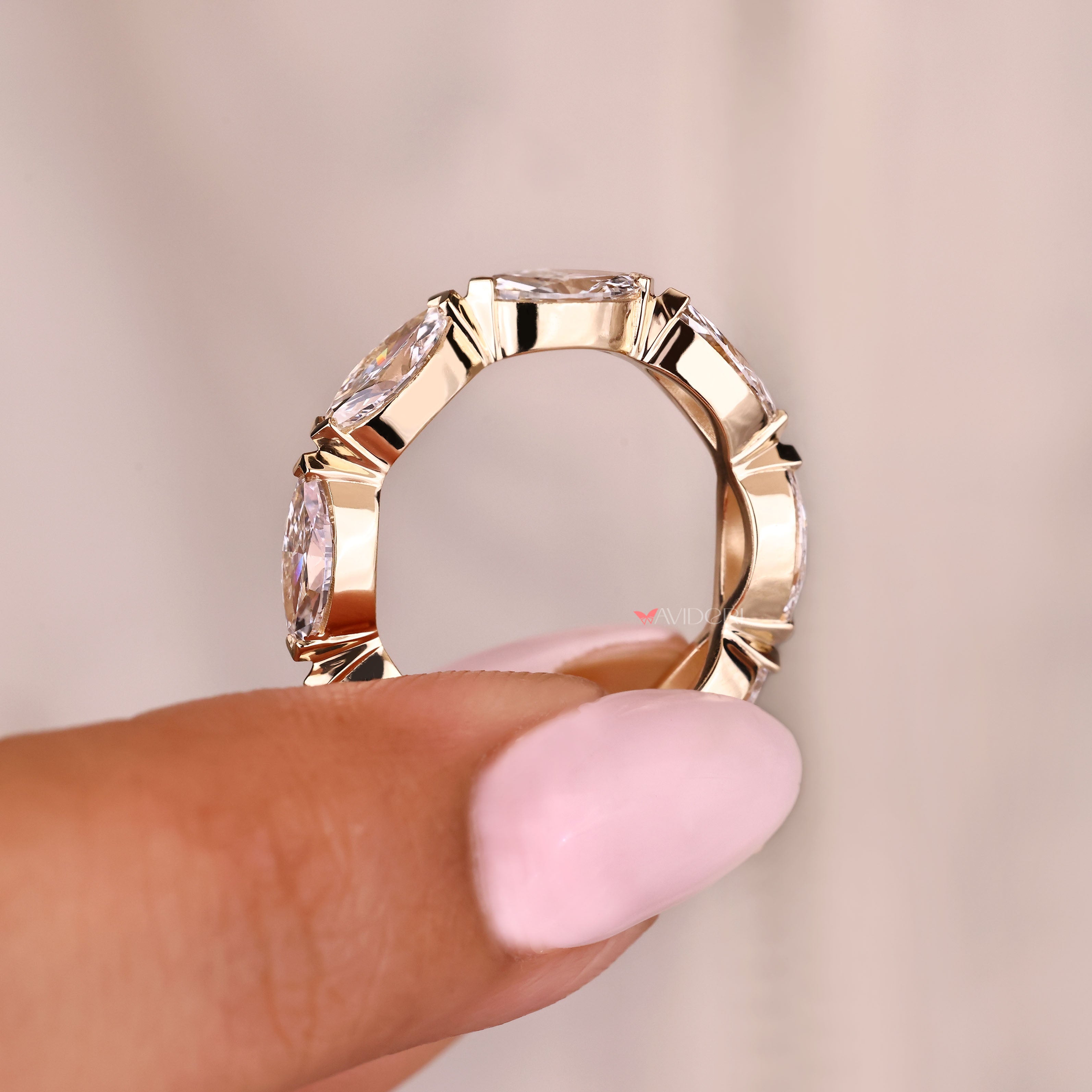 Marquise ring band with eternity style and prong setting
