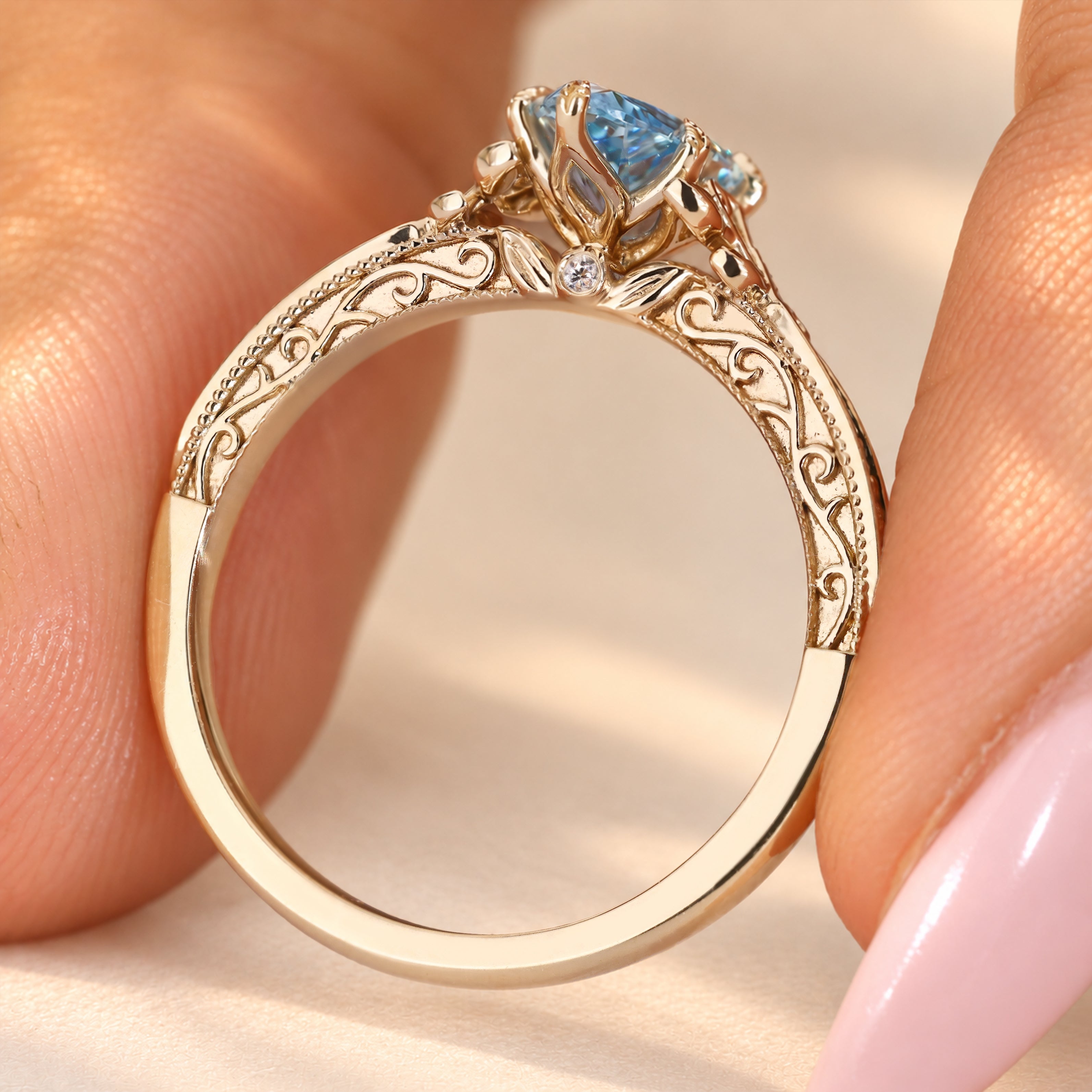 Art Deco pear diamond ring with tulip basket setting.
