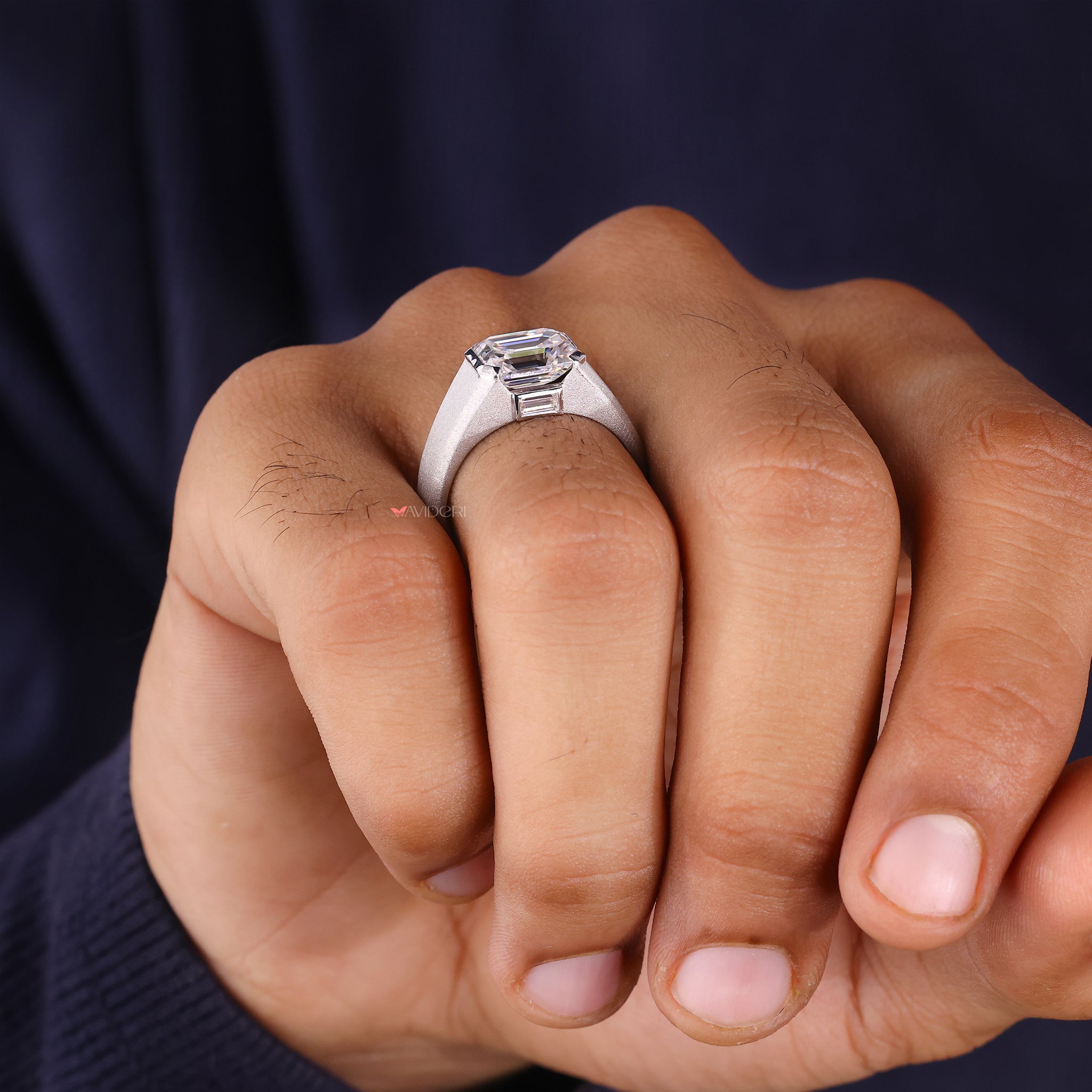 East to west diamond setting ring presents a modern twist on traditional wedding bands.

