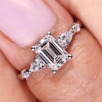 Five Diamond Emerald Diamond Engagement Ring