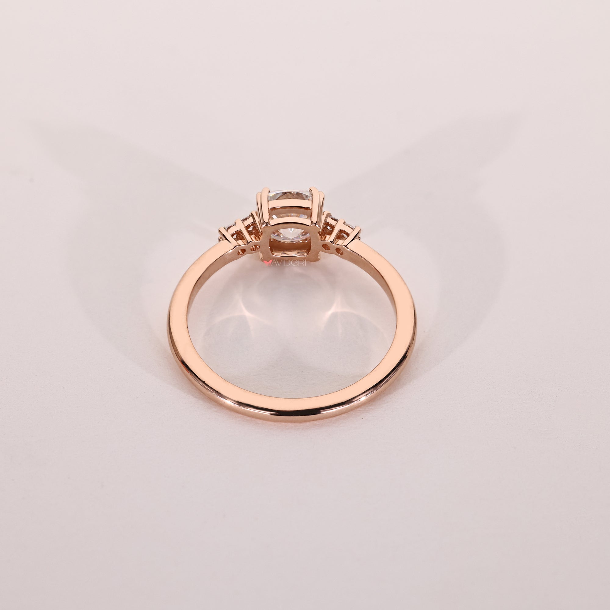 5 stone ring designed to add layered sparkle and symmetry to your bridal stack.
