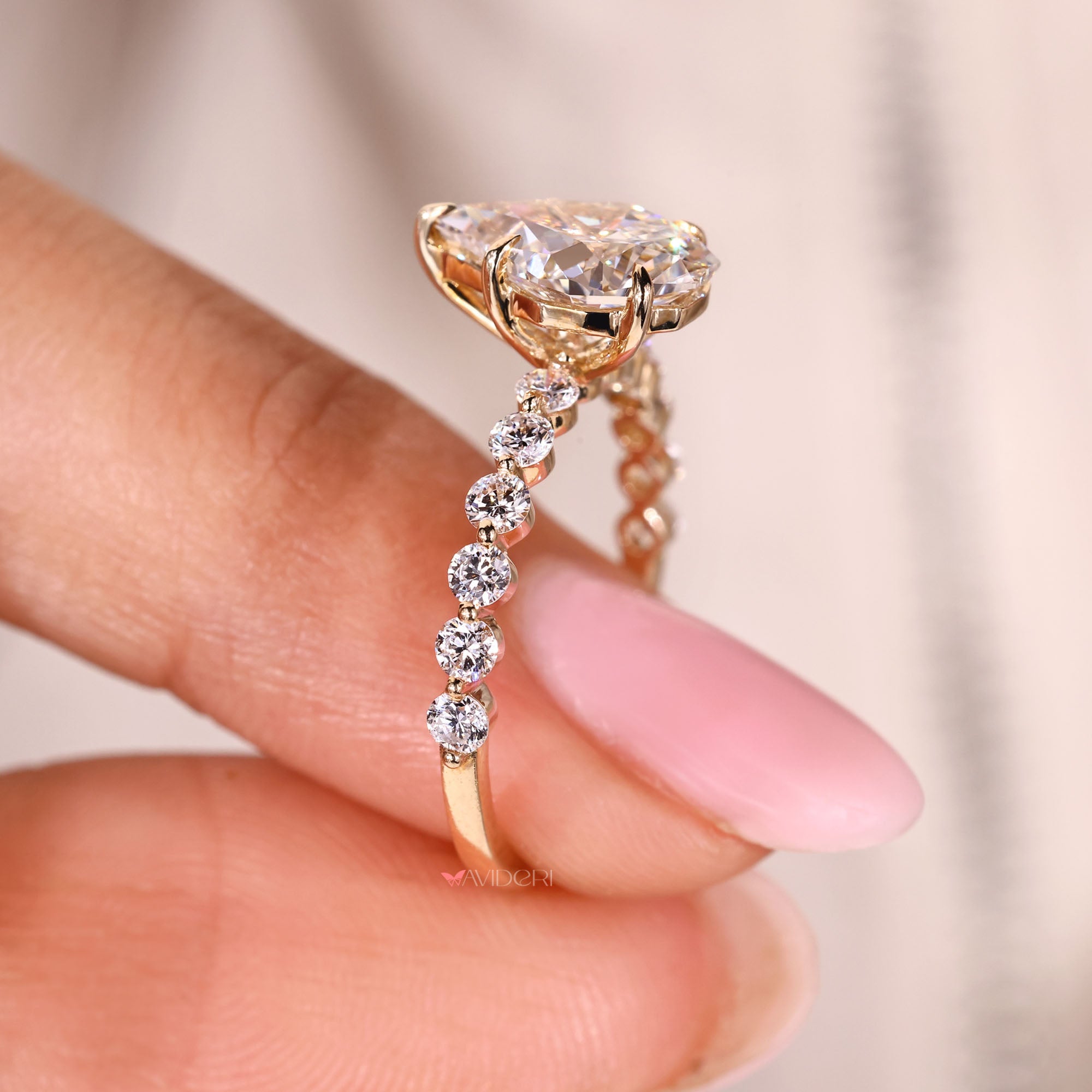 Floating bubble band ring with round cut diamonds.