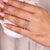 Round diamond ring with floating bubble prong setting.