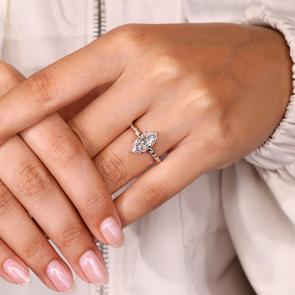 Handmade marquise ring with claw prong setting.
