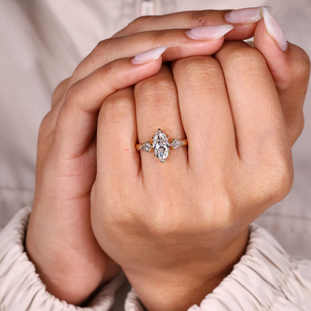 Marquise ring with V prong setting.
