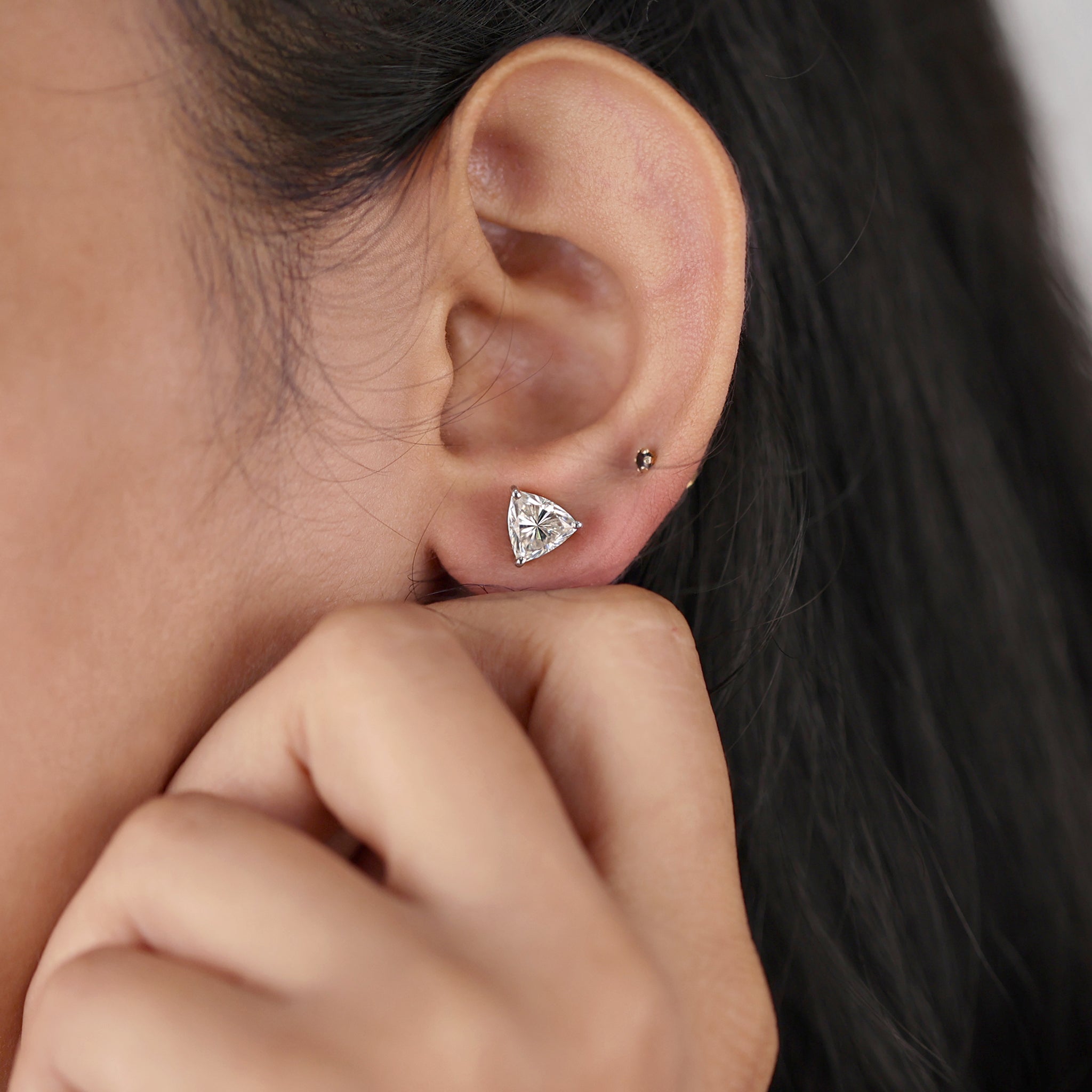 These Moissanite stud earrings shine with brilliant clarity.