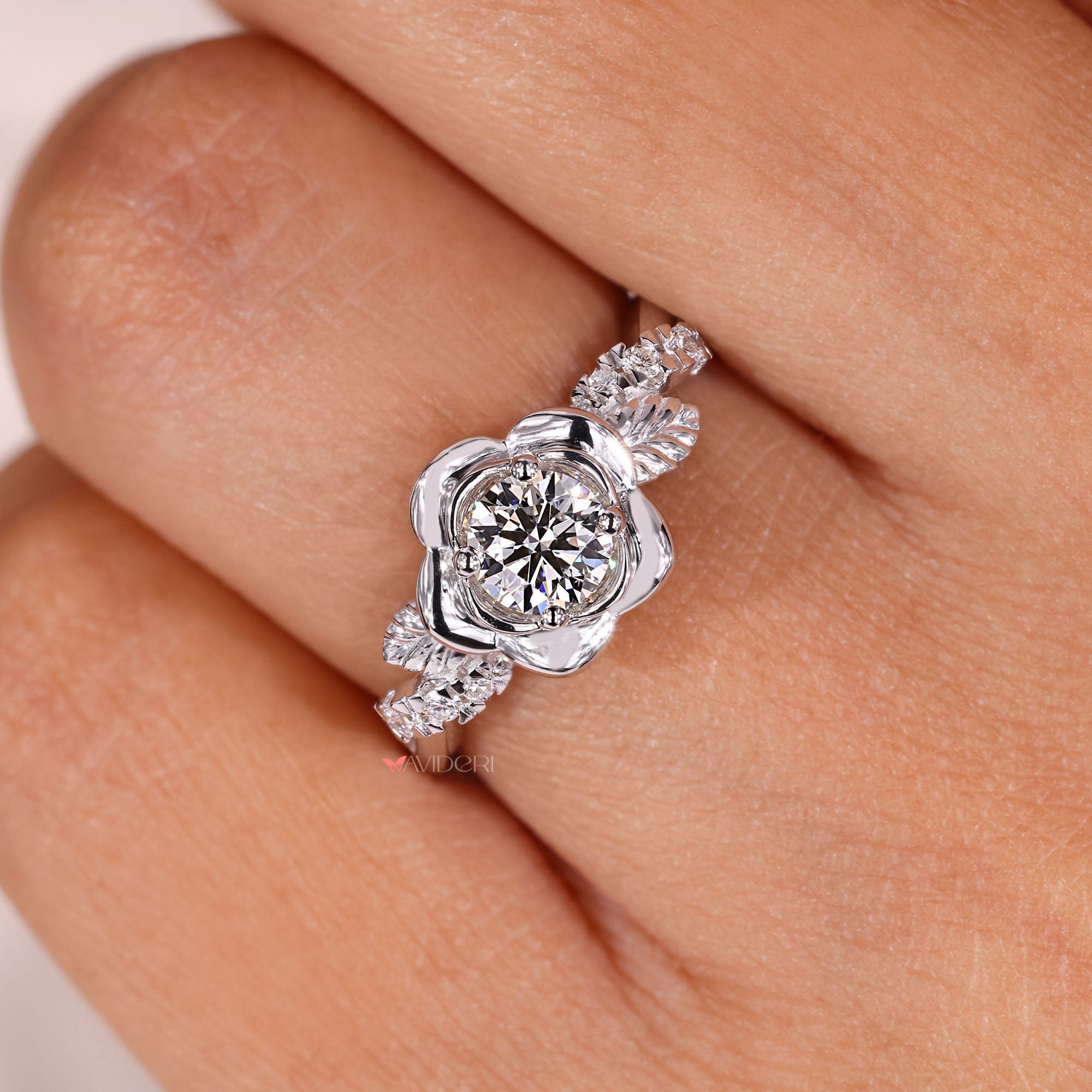 Anniversary gift round diamond engagement ring with nature-inspired design.