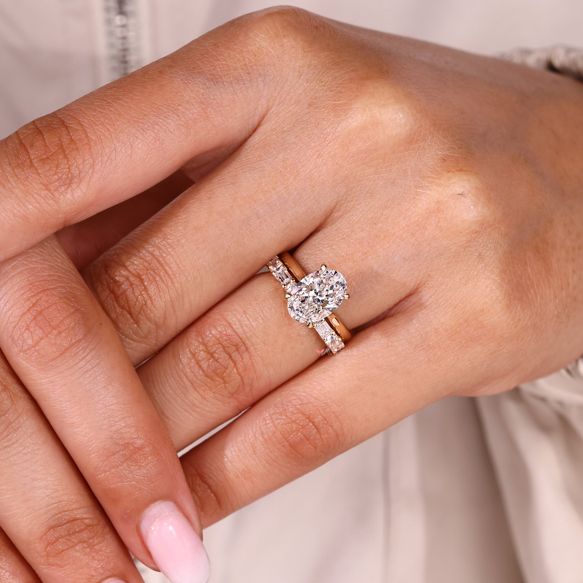 Lab grown oval diamond bridal set with half eternity band.