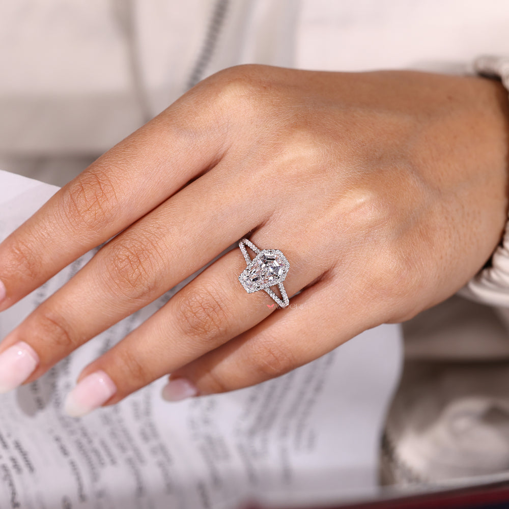 Halo coffin diamond ring with pave band.
