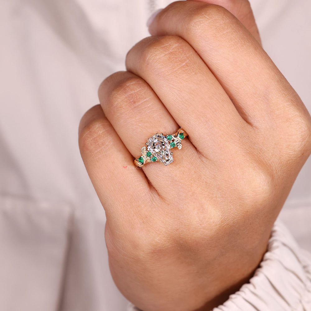 Nature inspired ring with green emeralds.
