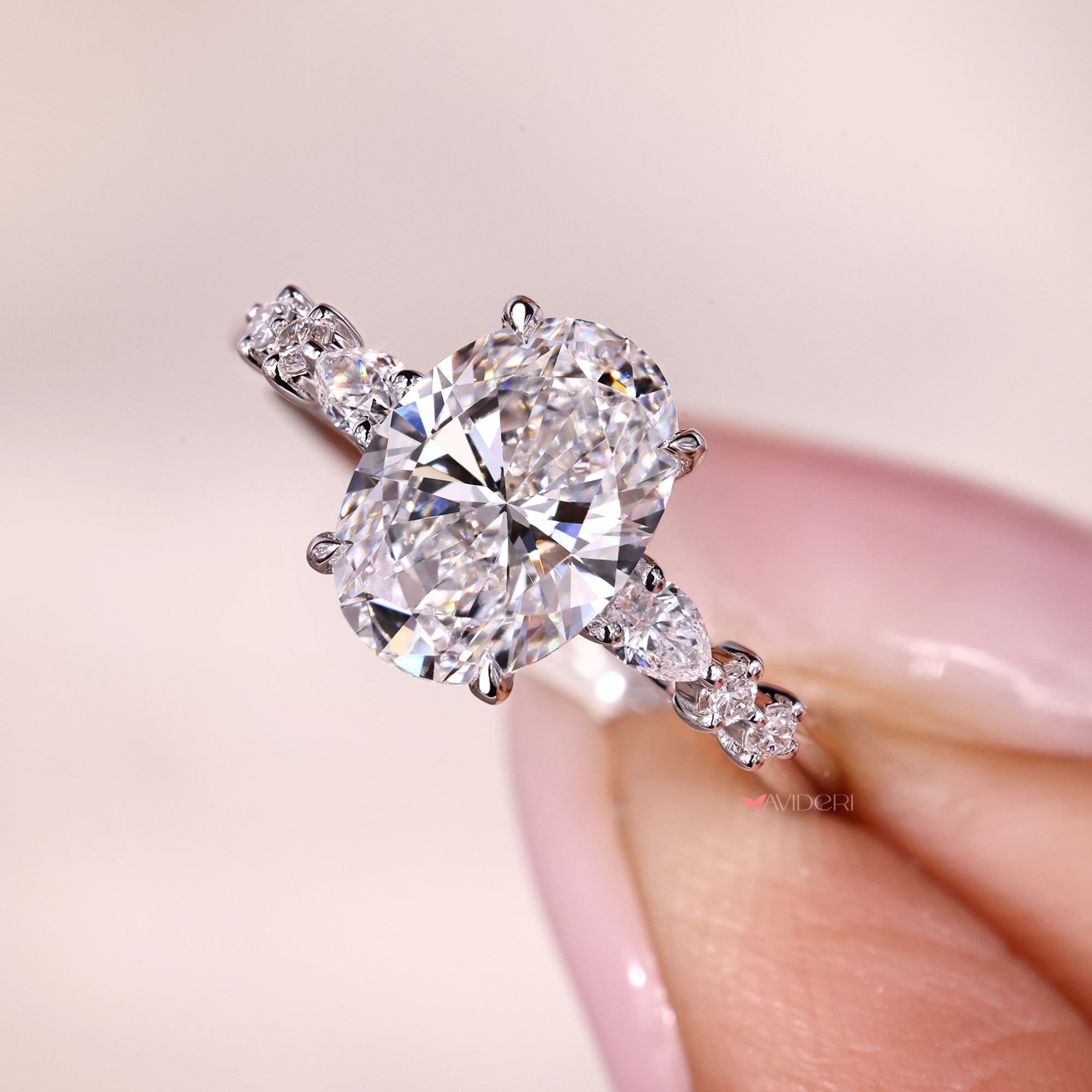 Four Claw Prong Seven Stone Diamond Ring.