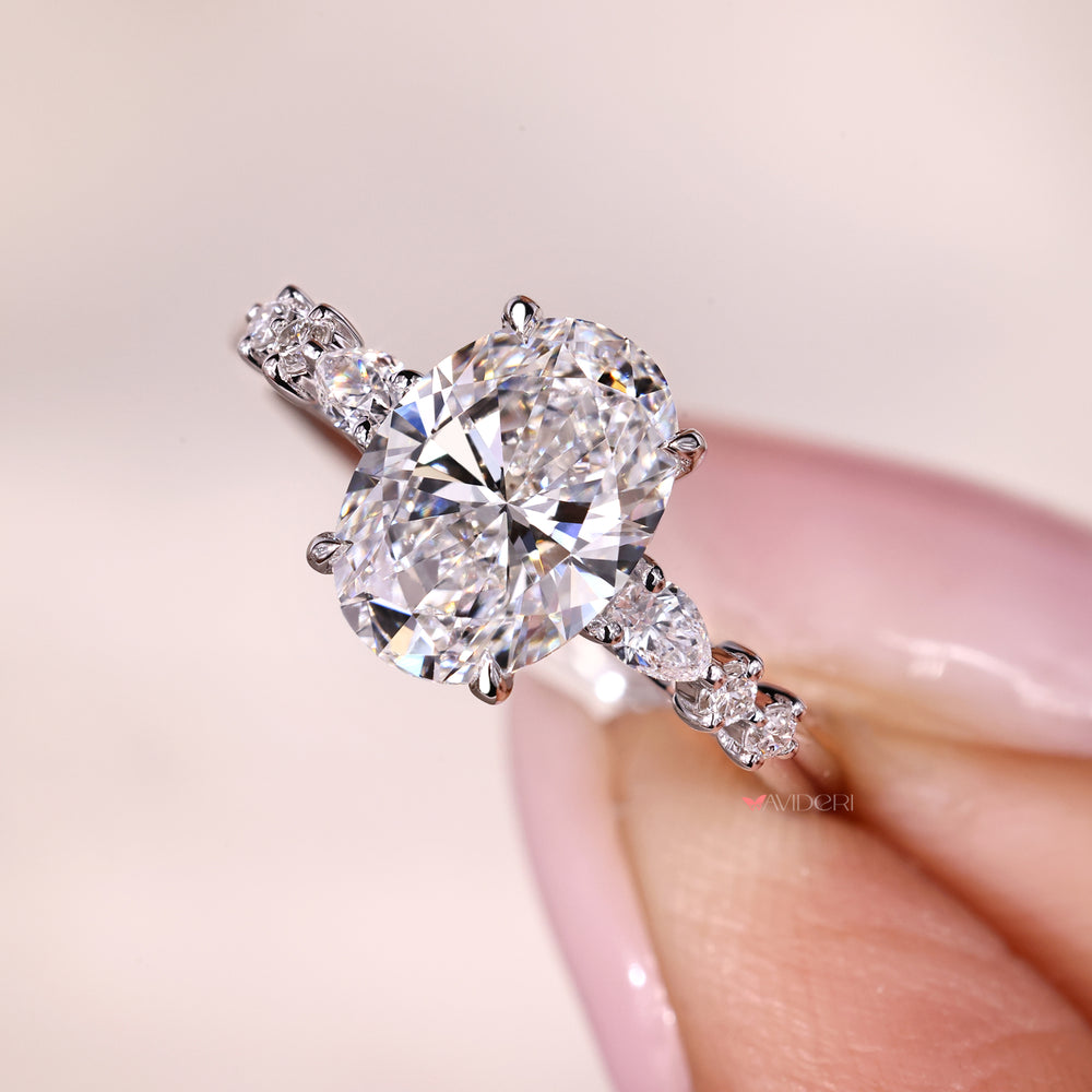 Four Claw Prong Seven Stone Diamond Ring.