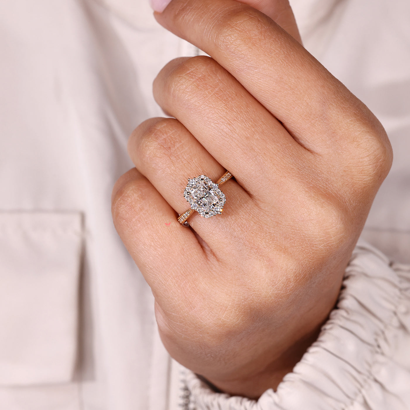 Radiant cut ring with tapered shank design.
