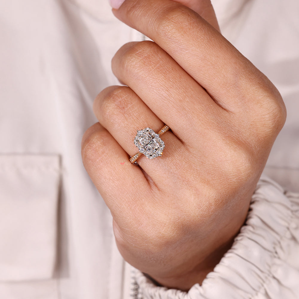 Radiant cut ring with tapered shank design.
