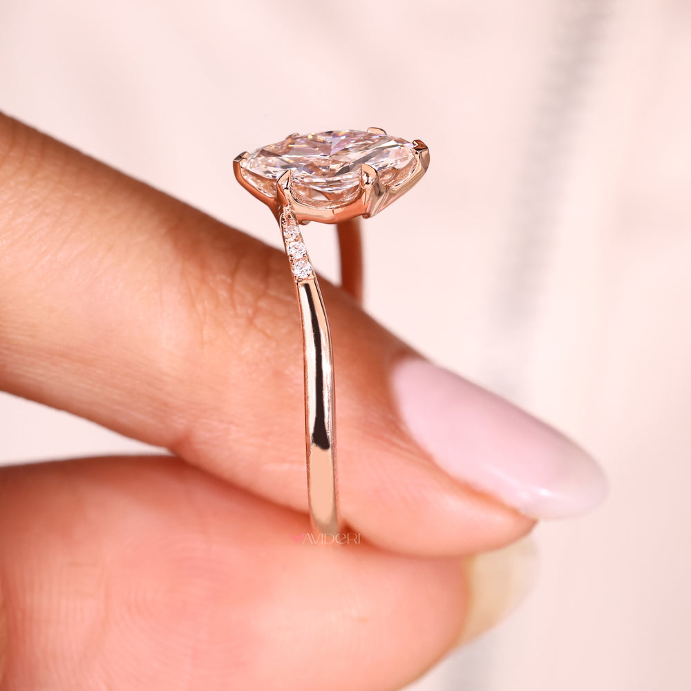 Lab grown marquise diamond ring with tapered shank.
