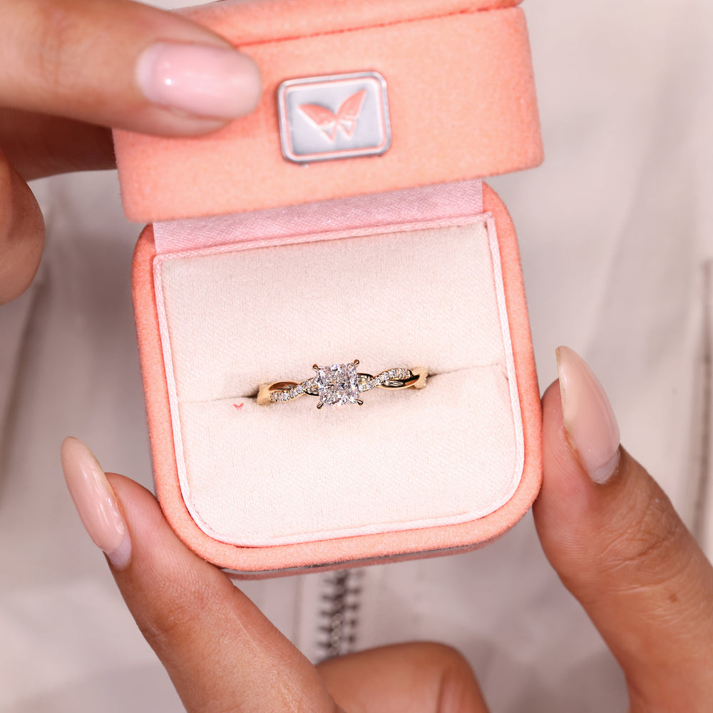 Princess diamond ring with basket setting and claw prongs
