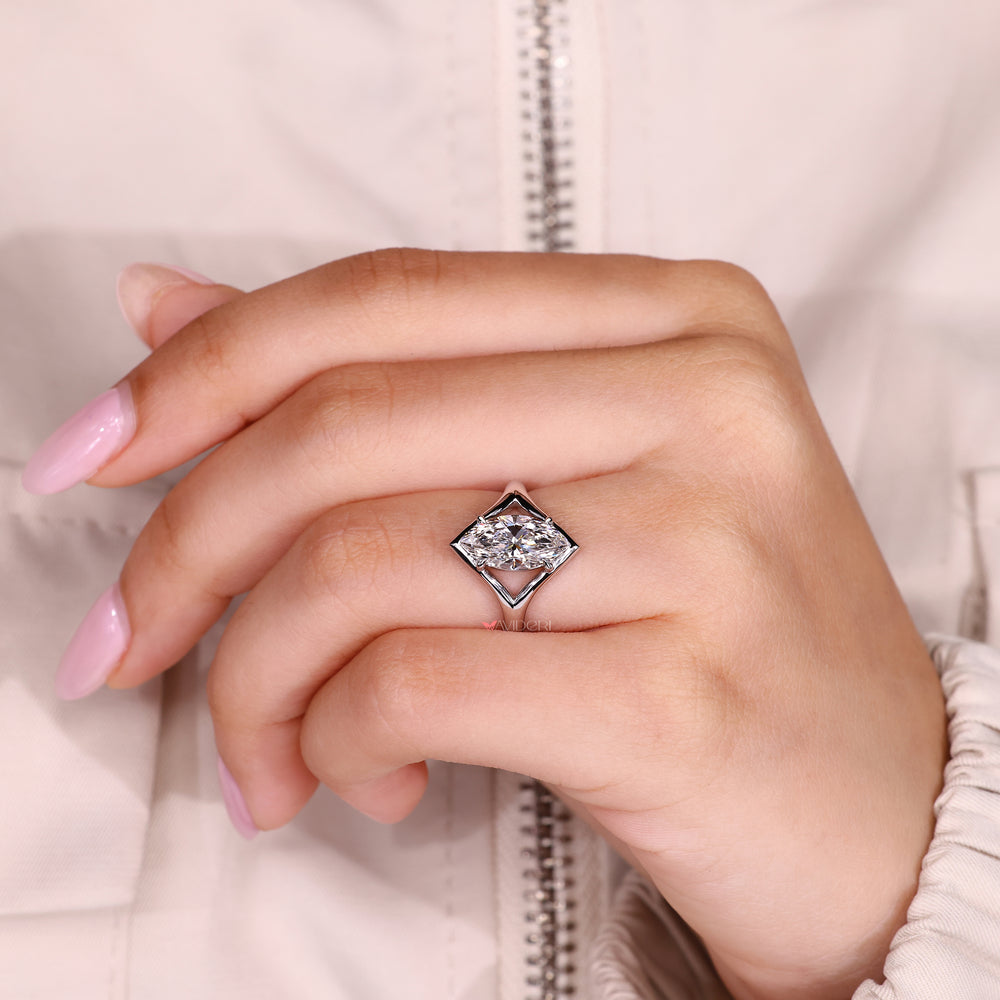 Handmade marquise diamond ring in solitaire style setting
