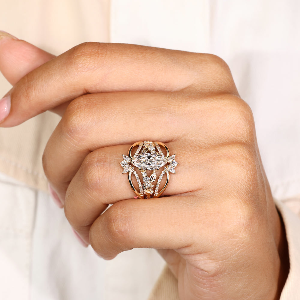 Marquise engagement ring with wrap guard band design
