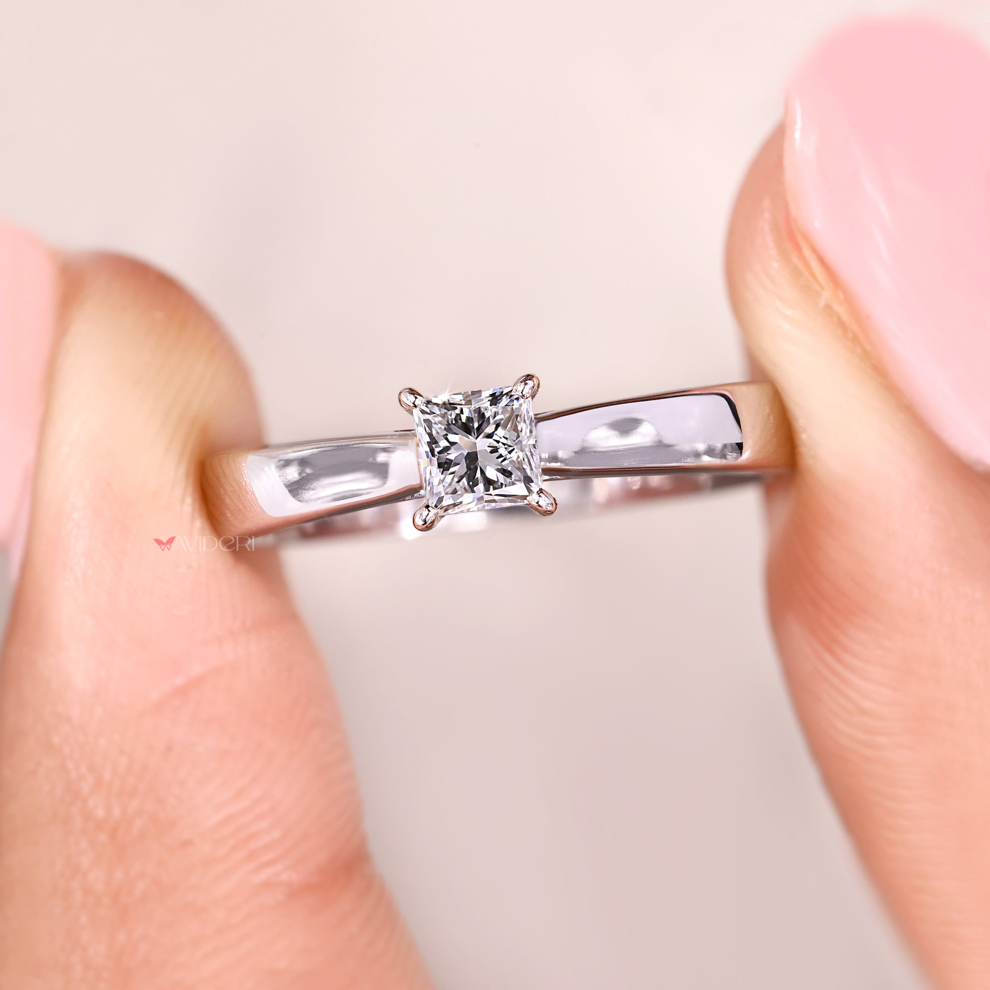 Four prong setting with lab-grown diamond ring.