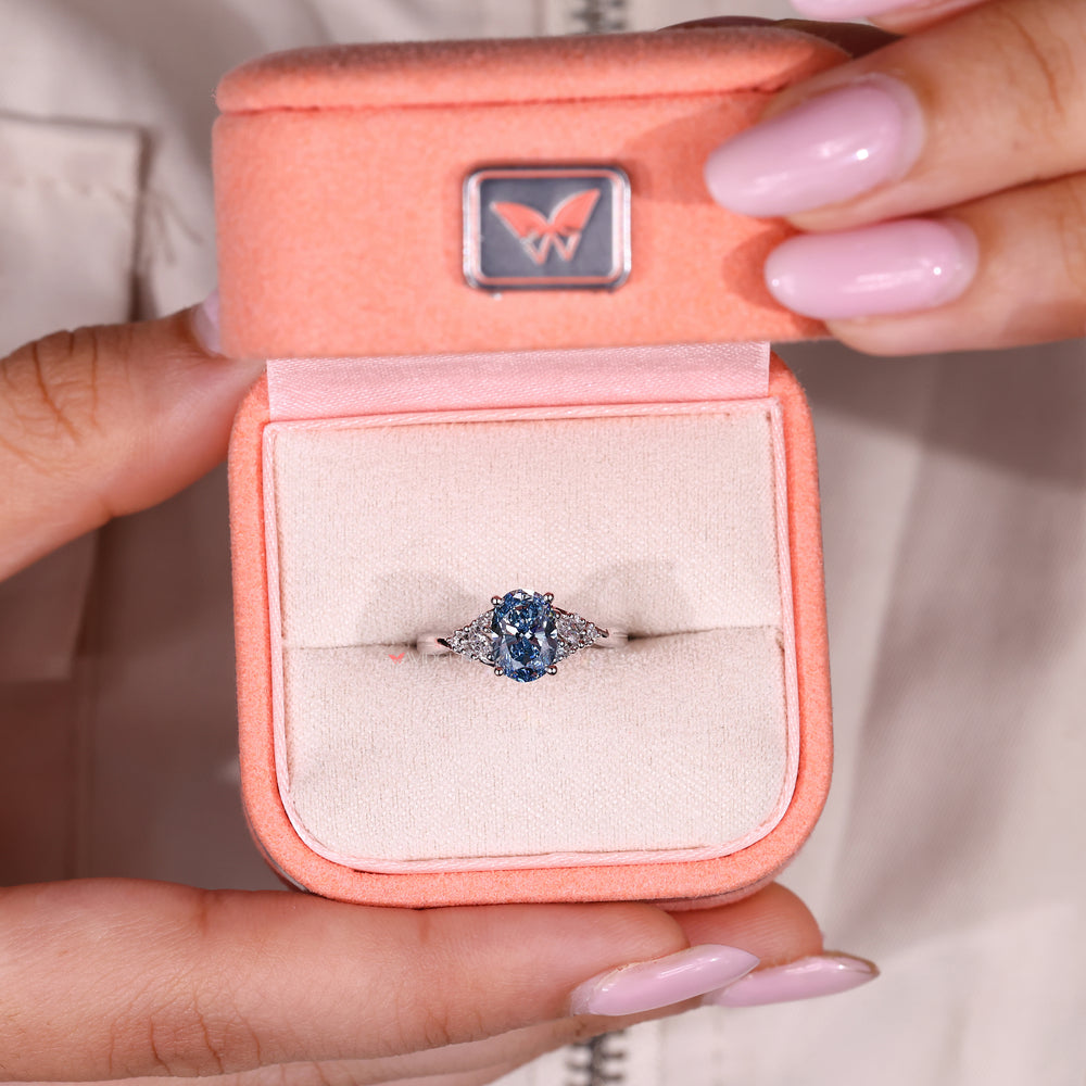 Twisted shank oval diamond ring design.
