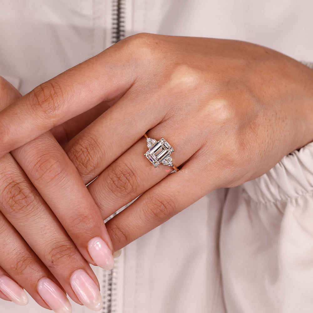 Handmade emerald cut diamond ring design.
