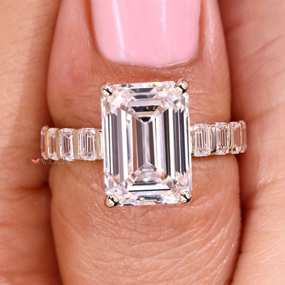 Bar setting emerald cut diamond ring lab grown.
