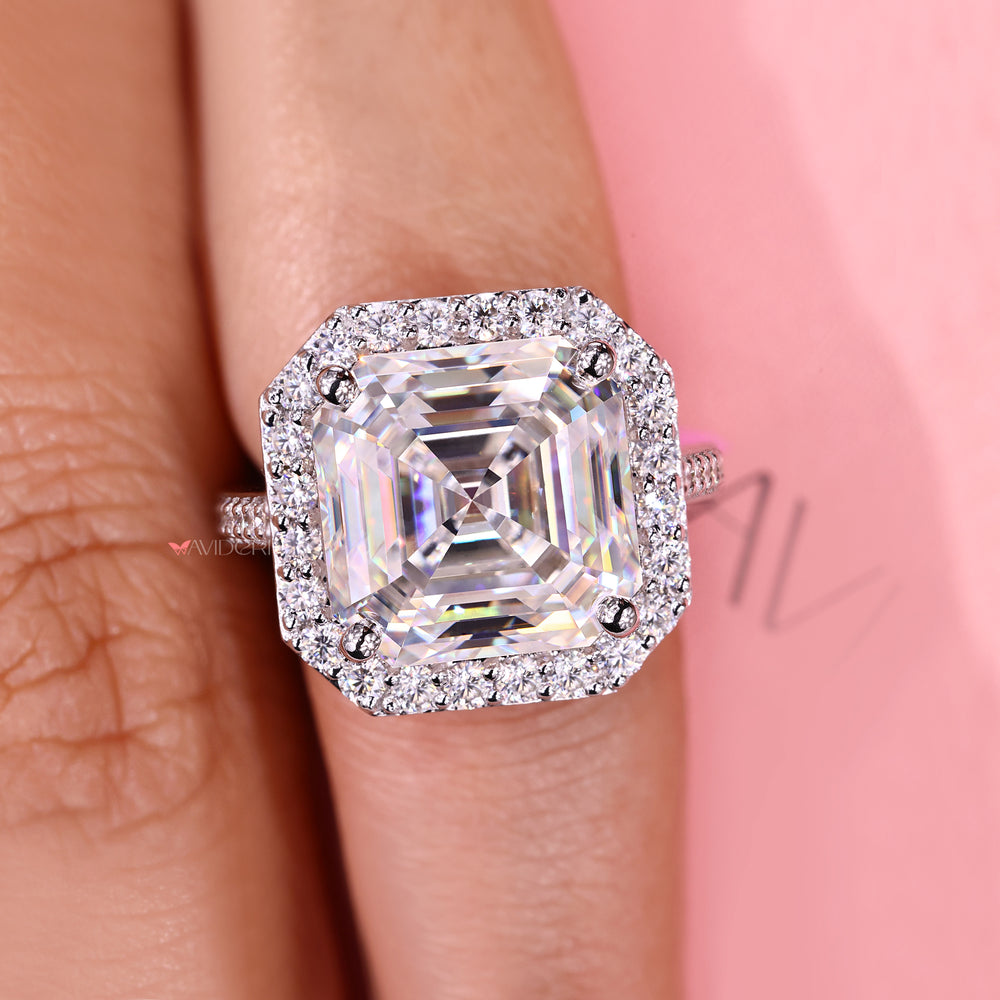 Asscher cut moissanite ring with round pave accents.