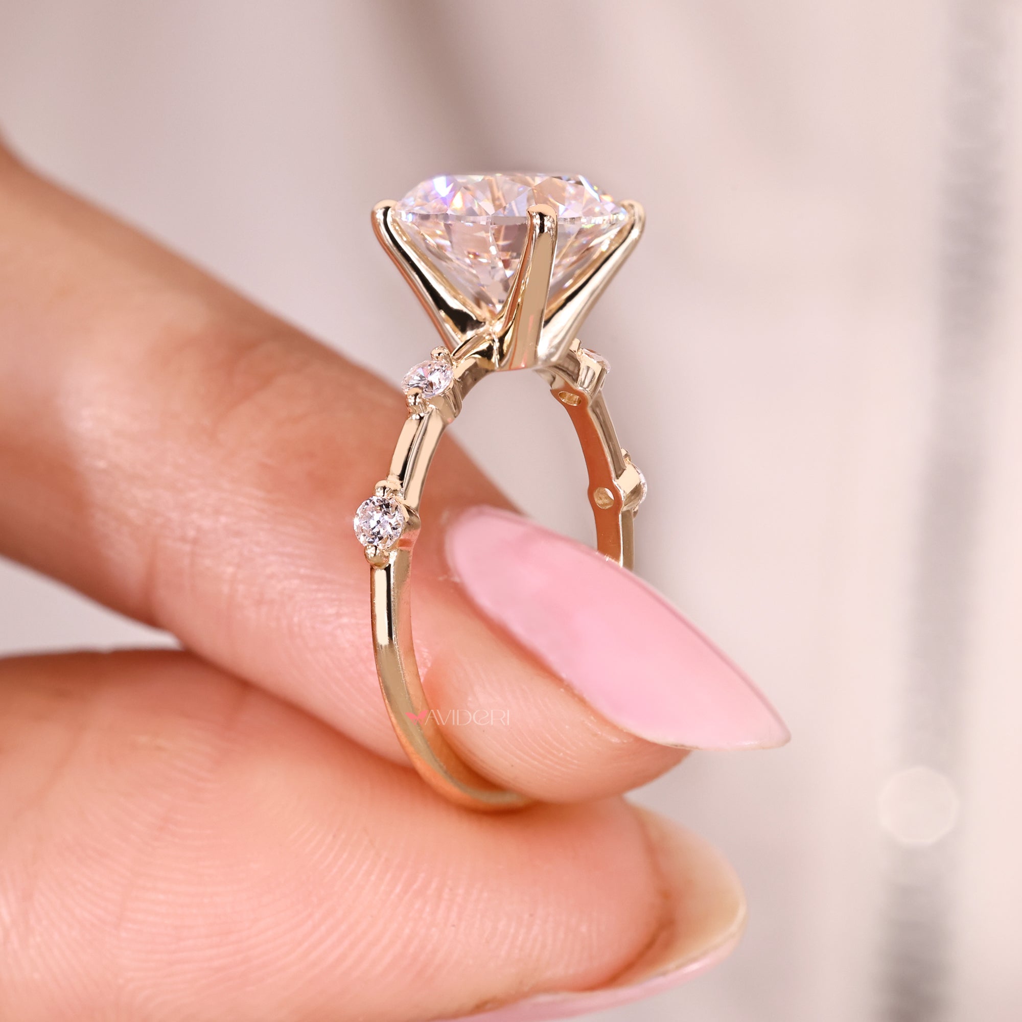 Four prong round cut diamond ring lab grown.
