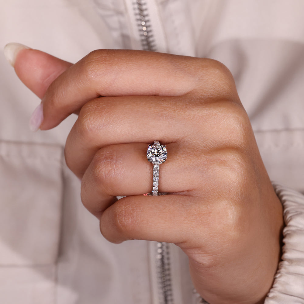 Handmade round diamond ring with straight shank.
