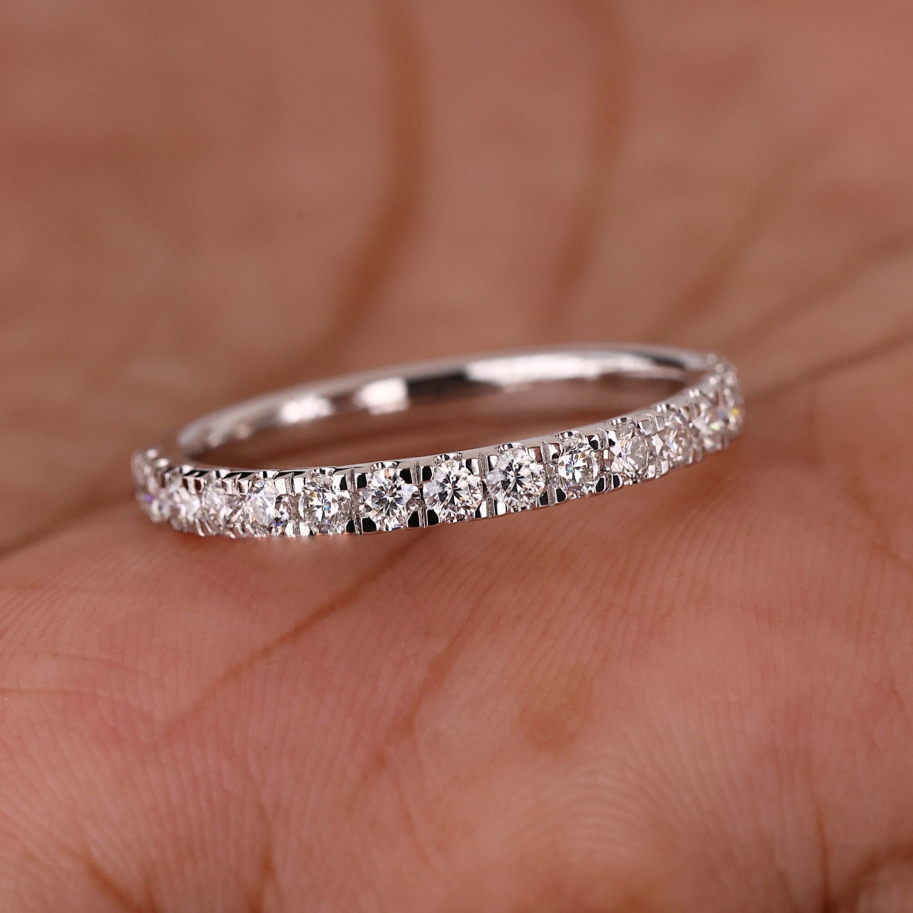 Half eternity wedding band with sparkling diamonds.
