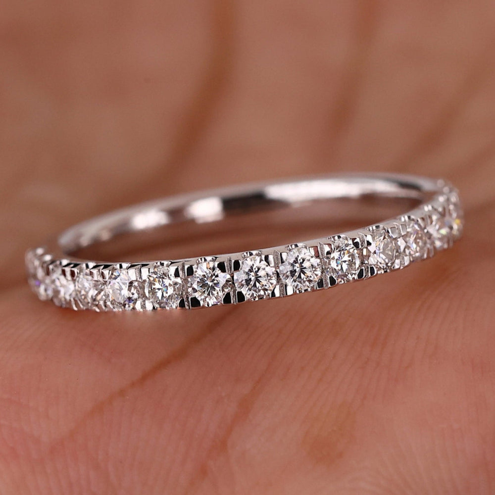 Half eternity wedding band with sparkling diamonds.

