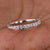 Half eternity wedding band with sparkling diamonds.
