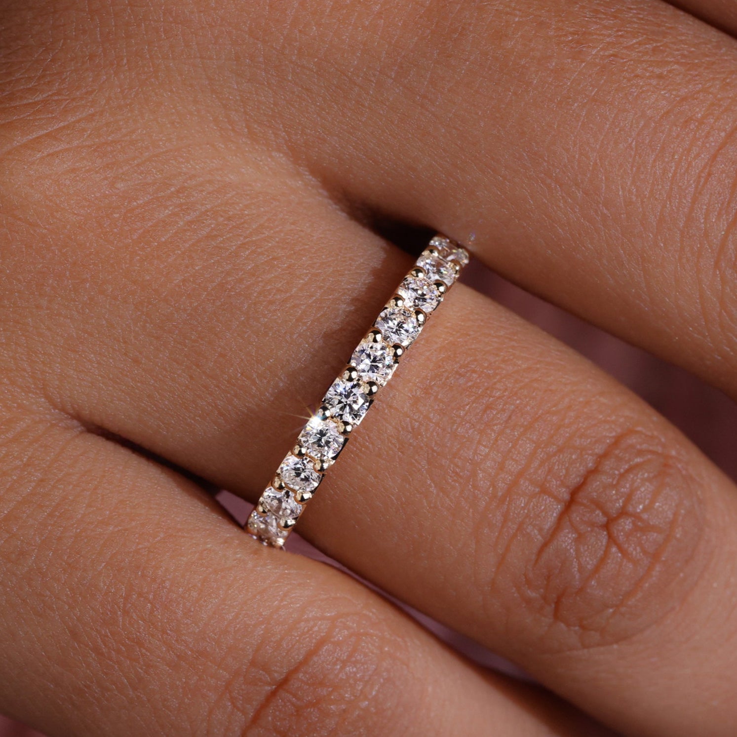 Full eternity band with continuous diamonds for a classic look.
