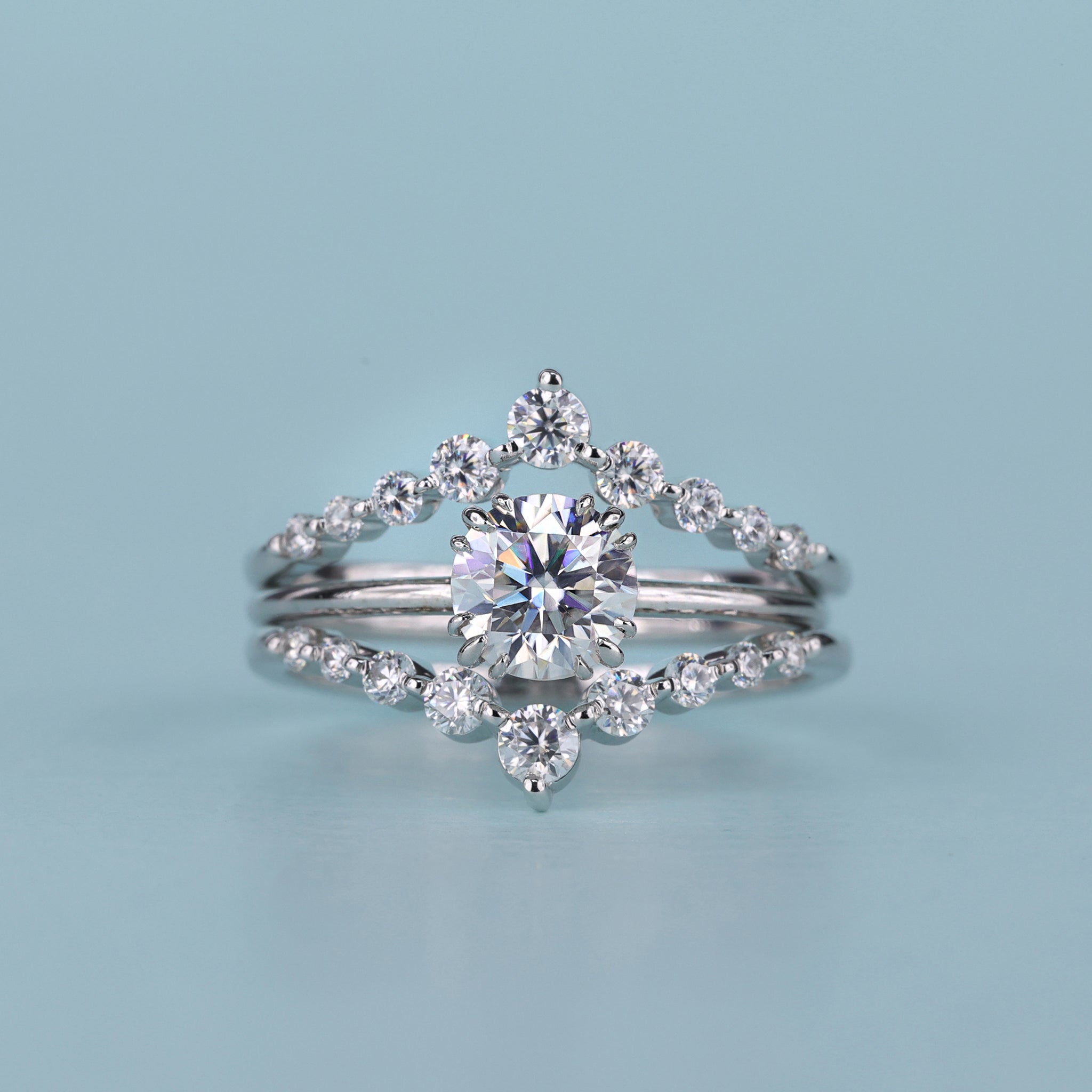 Round Cut Solitaire Ring with Guard Wrap Band and gold design.
