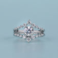 Round Cut Solitaire Ring with Guard Wrap Band and gold design.
