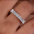 Princess cut diamond band with sleek design.

