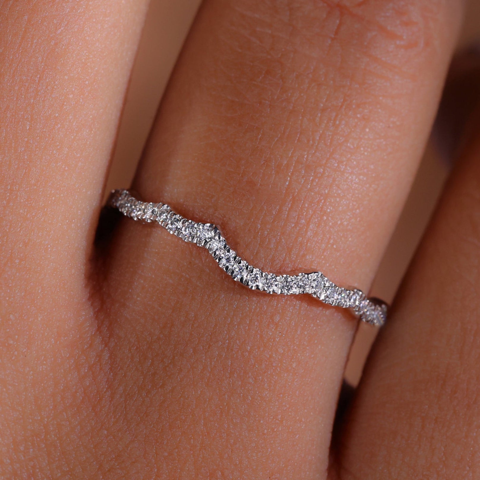 Round diamond eternity band with continuous sparkle.
