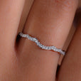 Round diamond eternity band with continuous sparkle.
