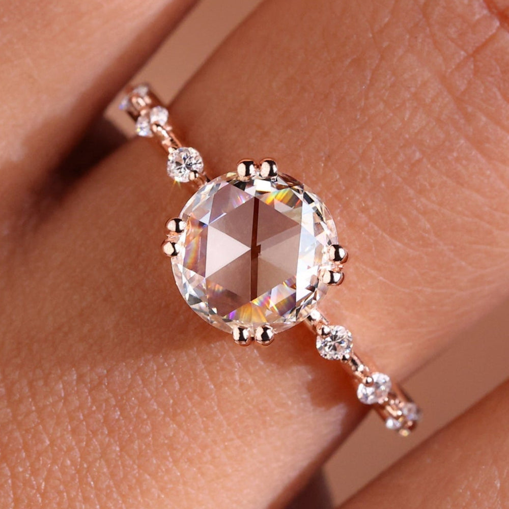 Rose cut diamond ring with a vintage-inspired design and intricate detailing.