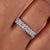 This half eternity band showcases fine craftsmanship and sparkle.
