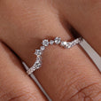 Stackable wedding band with sleek design.
