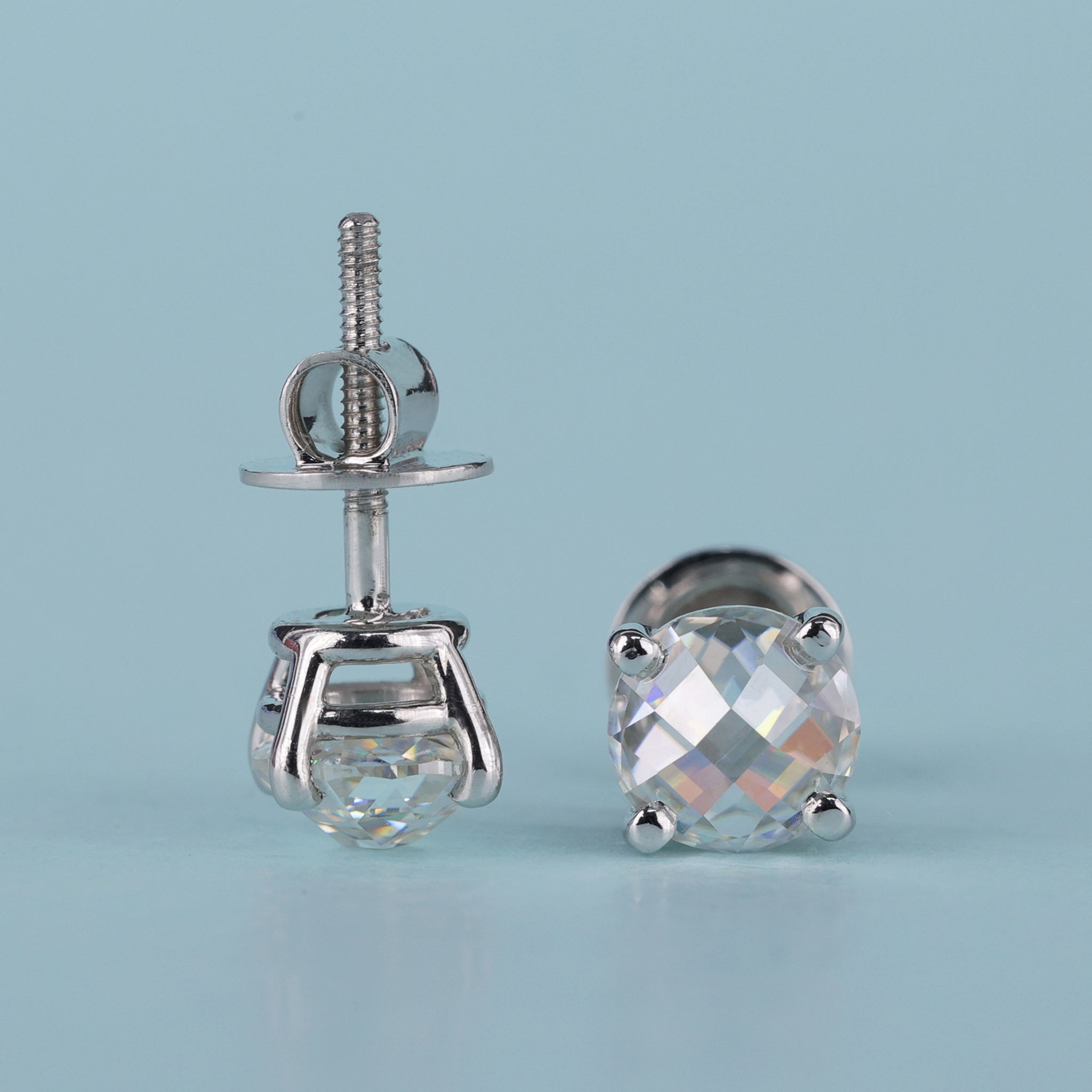 The checkerboard round earrings add a unique touch.