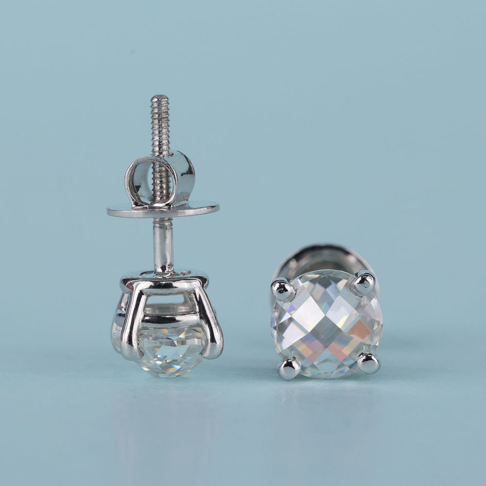 The checkerboard round earrings add a unique touch.